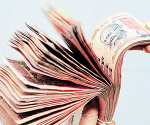 Mobile and cash taken from company officer