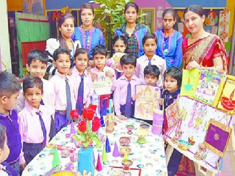 Deepotsv children on Rangoli made