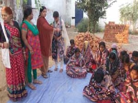 Women prisoners in jail doing yoga
