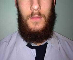 no entry in school for beard student.