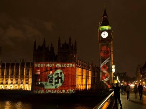 Indian Prime Minister 'not welcome' as Awaaz projects warning onto Parliament