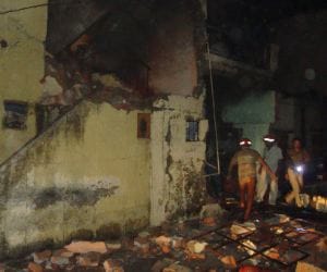 cylinder blast, three-story building demolished