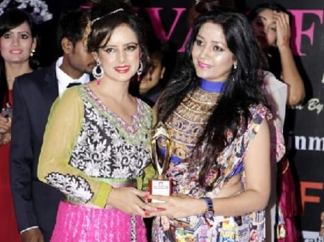 Amita crowned as miss beauty of the year.
