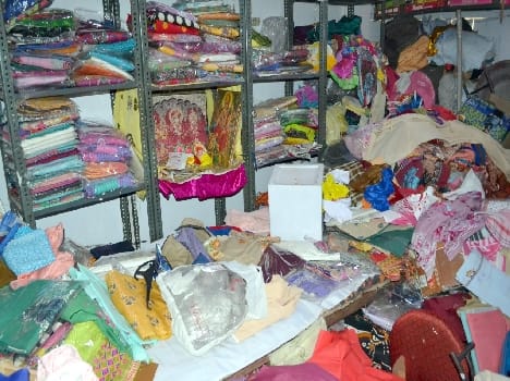 Break in and steal millions in sari stores
