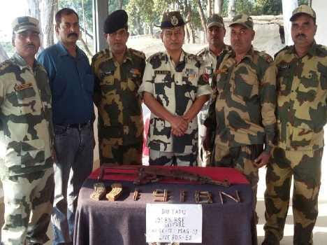 BSF seized weapons, ak 47, Magazine and cartridges at pakistan border 