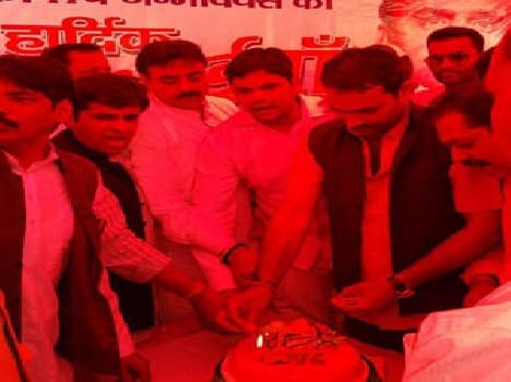 Cutting a cake to wish a long life