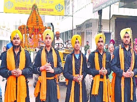 Sri Guru Nanak Dev Board of Bishops on the lights decorating the Diwan