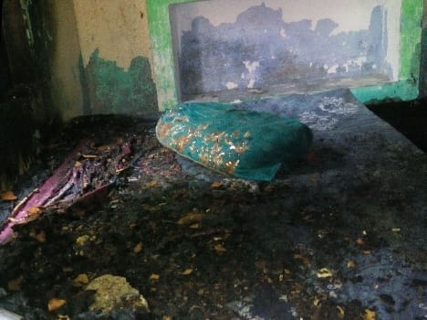 some anti social elements tried to kill a pradhan in sleep by fire