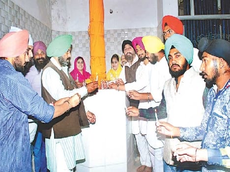burning candle for nishan sahib