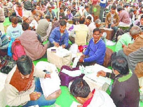 Workers prepare to vote