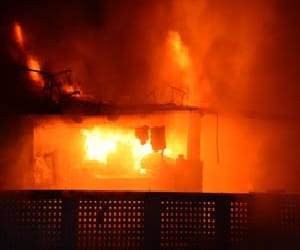 fire in the parking, half a dozen cars ash
