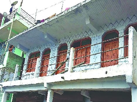 Authorities have seized two storey houses