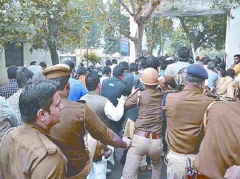 BJP members and  police embattled