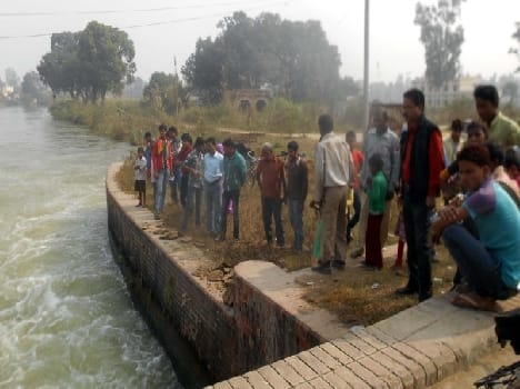 The body of the young man in canal
