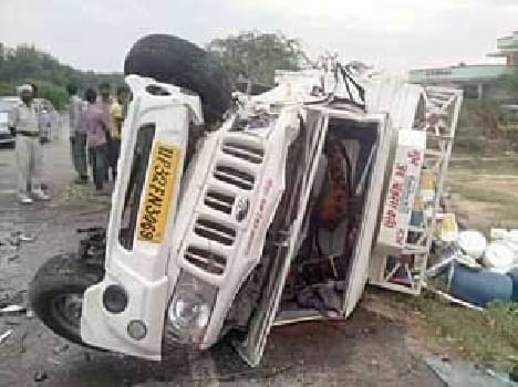 Two killed in collision of car , pickup , fou