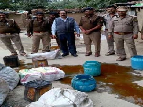 52 liters of illicit liquor seized in raids raw