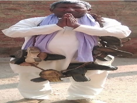 Wearing a garland of shoes are seeking votes