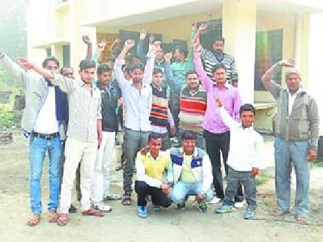 Villagers on power demonstrating