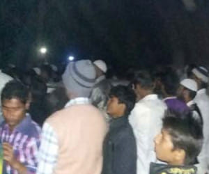 How were covered bus crashed into death, lying dead bodies