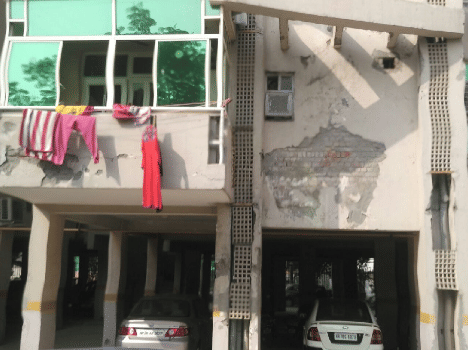 People protest against the Society's  flat.