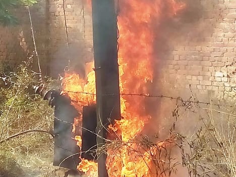 High tension line transformer burned by falling