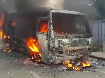 Video: Bus set fire after bike collision, safely rescued children