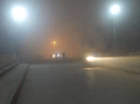 Fog at the curb , crawling vehicle