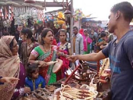 Women gathered in buying household goods