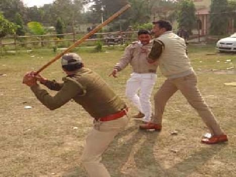 SC College Banjkr sticks rush police supporters.