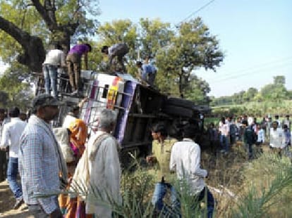 bus hanging on bridge at haridwar.