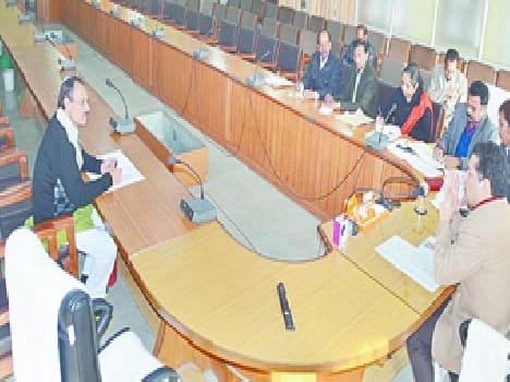 A leader and eight officials