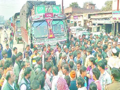Teen killed by truck crushing