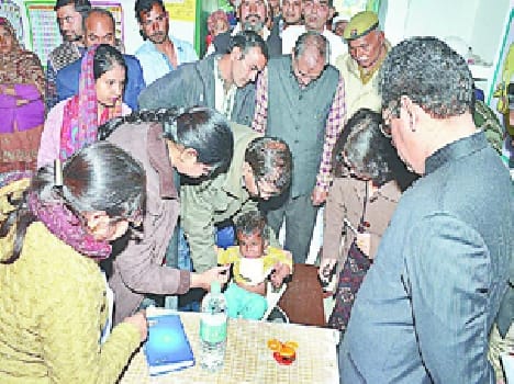 malnourished children weighed
