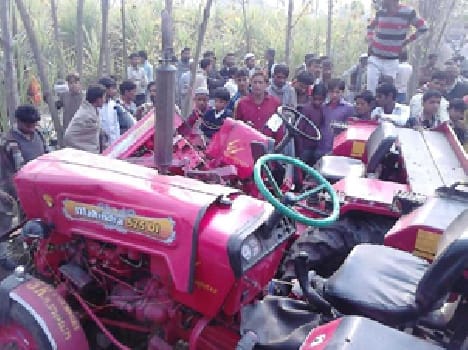 Woman Caught between tractors, death