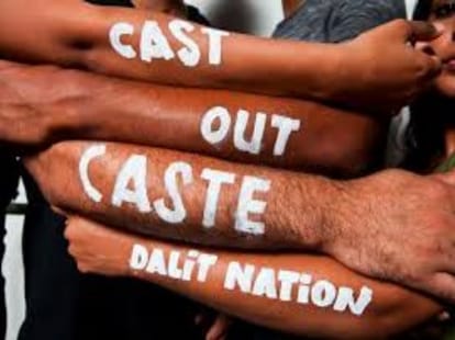 dalit families forced to walk with shoes on head