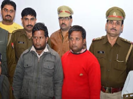 Large amounts of fake liquor seized, two brothers arrested