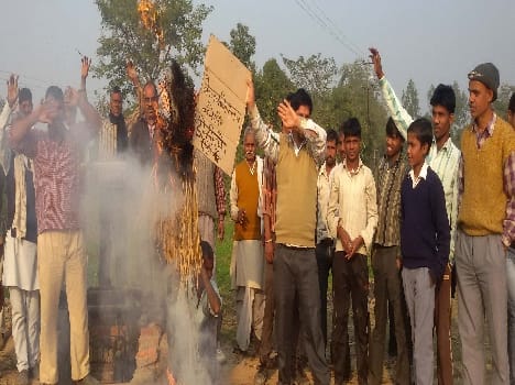 Cane Commissioner burnt effigies