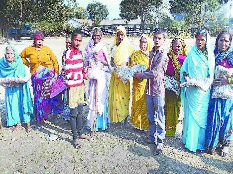 Poor elderly women presented shawls