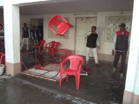 BJP uproar , threw chairs