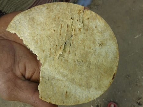 half cooked bread in mid day meal