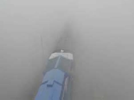 Stretched sheet of fog , grew chill