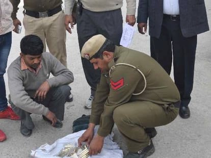 suspicious man arrested with pakistani sim and weapons