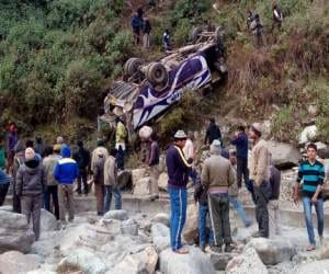 bus fell into trench, 2 died.