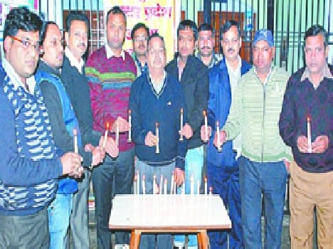  Candle lighting tribute to martyrs