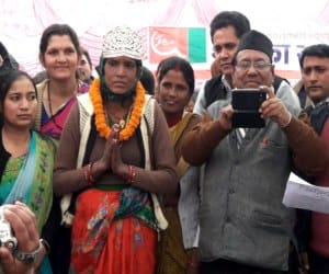 raija devi won grass cutting competition, get silver crown.