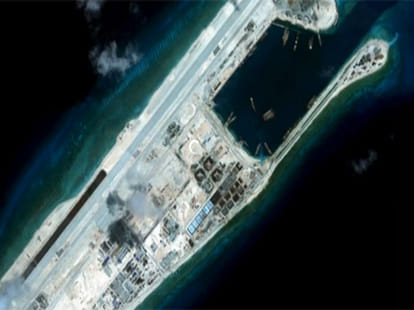 S.China Sea tensions surge as China lands plane on artificial island