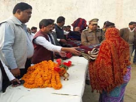 He distributed blankets to detainees