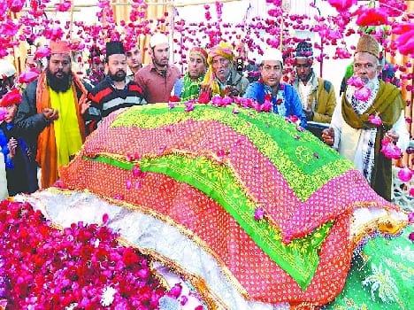 Urs of white heart-cherry Wali removed in procession of container