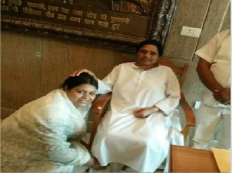 Miffed with candidate's touching feet-post on FB, Maya cancels her ticket