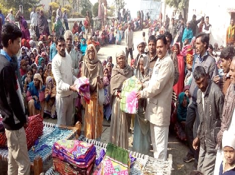 And blankets to the poor Distributed saris